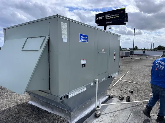 American Standard commercial rooftop unit installed on a flat roof